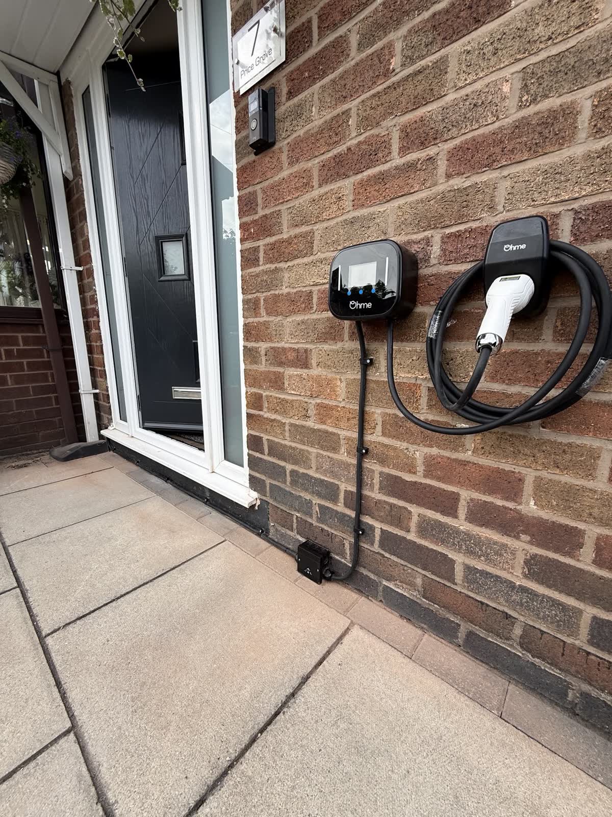 Ohme charger beside the front door